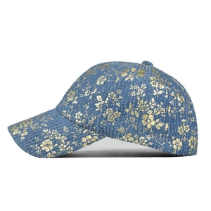 Blue tweed baseball cap featuring gold floral patterns and high-quality cotton lining