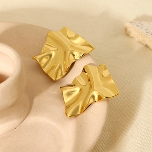 Minimalist gold plated 316L stainless steel earrings with textured liquid metal design