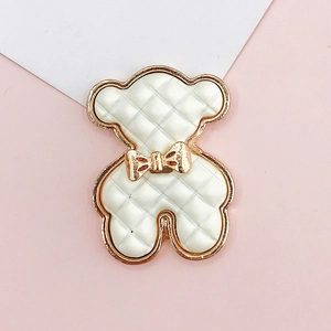 White teddy bear charm with gold metal trim and diamond texture for DIY jewelry making