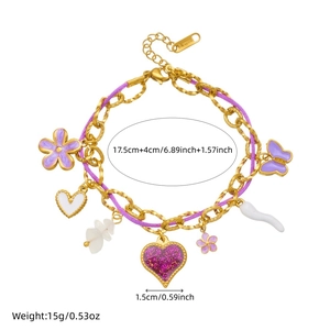 Purple butterfly and flower charm bracelet in stainless steel with golden link chain