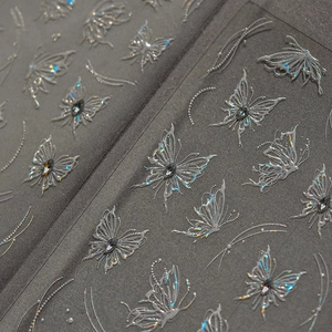 3D silver butterfly nail art stickers with crystal gems and liquid metal texture