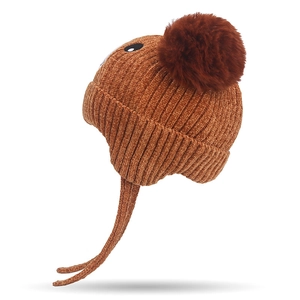 Brown baby knit hat with large faux fur pom-pom and warm earflaps with braided ties