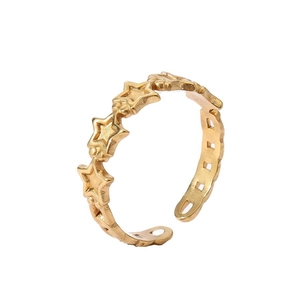 Detail of adjustable 18k gold plated ring featuring interconnected hollow star shapes