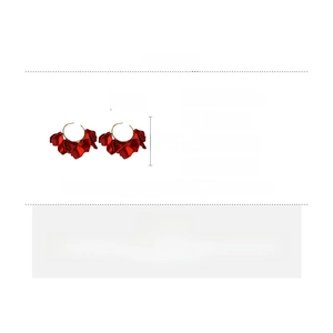 Detailed view of red acrylic flower petal earrings with dimensions 9.5cm and silver needles