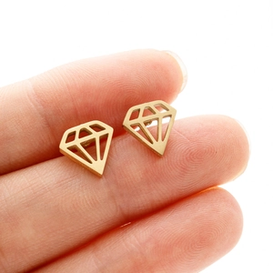 Macro detail of 18K gold plated stainless steel geometric diamond shaped stud earrings