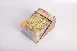 Detail of Christmas tree ornaments kit featuring golden glitter balls and Merry Christmas sign