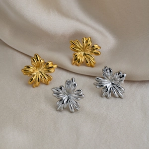 Floral stainless steel earrings in gold and silver finish with textured petals