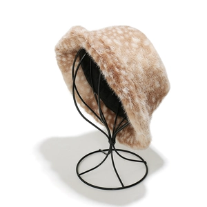Close-up of faux fur texture and black fabric lining on the spotted deer bucket hat