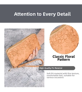 Detailed close-up of tan PU leather wallet featuring elegant embossed floral patterns
