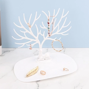 White antler tree jewelry stand with oval tray for organizing necklaces and earrings