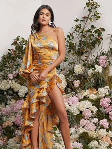 Detail of floral one-shoulder dress with ruffled high slit and purple flower pattern
