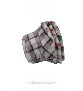 Detail of soft purple and pink checkered faux fur texture on this winter bucket hat