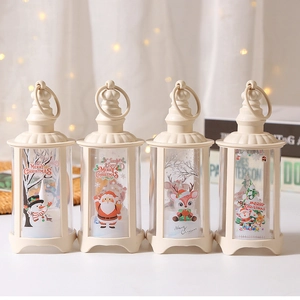 Set of four cream Christmas LED lanterns with festive patterns on a warm bokeh background