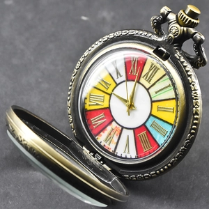 Vintage bronze pocket watch with colorful Roman numeral dial and intricate embossing
