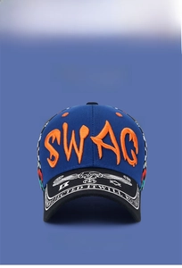 Detail of blue baseball cap featuring orange SWAG 3D embroidery and printed brim