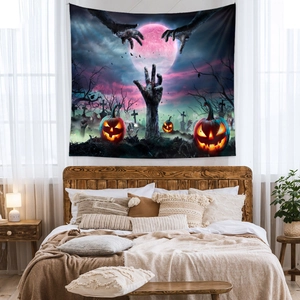 Close-up of Halloween tapestry with zombie hands, pink full moon, and glowing pumpkins