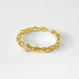 Elegant 925 sterling silver gold ring with hollow geometric flower and cubic zirconia