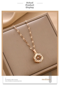 Detailed close-up of rose gold necklace with a floating heart pendant on jewelry box
