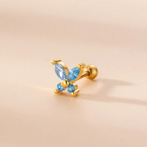 Pendiente de mariposa dorado con circonitas azules y cierre de bola esférica elegante