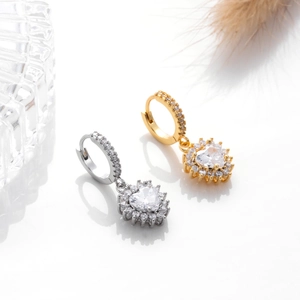 Elegant heart-shaped zircon drop earrings in gold and silver finishes with crystal pavé