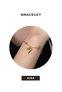 Macro view of 18k gold plated heart anklet with small beads and delicate chain detail