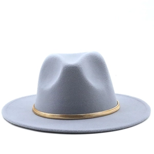 Detail of light gray felt fedora hat featuring a stylish gold snake chain decorative band