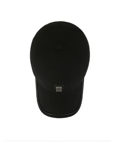 Top down view of black wool winter baseball cap with leather trim and metal detail