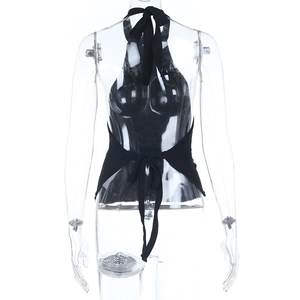 Detail view of black halter knit top showing the open back with adjustable tie closure