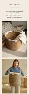 Vue détaillée d'un panier de rangement en rotin tressé à la main avec pompons blancs
