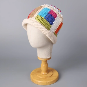 Handmade colorful crochet bucket hat with vintage rainbow patterns and knit texture