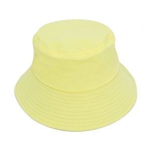 Classic yellow cotton wide-brim bucket hat for outdoor sun protection on white background