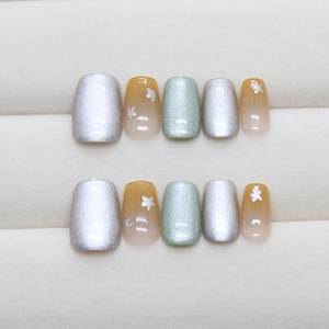 Star pattern cat eye press-on nails with blue and silver gradient glitter finish