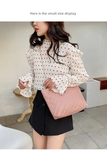 Pink quilted tote bag with pearl pendant and chain strap detail in a small size