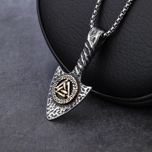 Viking arrow pendant necklace with runes in silver and gold tone on leather base