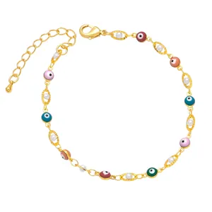 Bohemian gold Evil Eye bracelet featuring colorful charms and elegant white pearls decoration