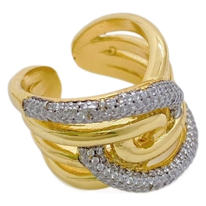 Modern irregular geometric golden ring with sparkling cubic zirconia on white background