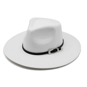 Detailed close-up of a white wool fedora hat featuring a black band and silver engraved buckle