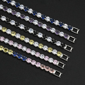 Detail of colorful tennis bracelets with round-cut zircon and silver claw settings