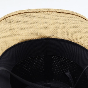 Detail of western straw hat showing mesh lining and elastic sweatband construction