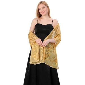 Detail view of exquisite gold sequined floral embroidery on elegant bridal evening shawl