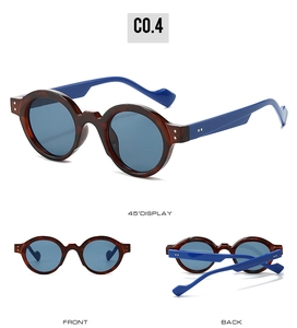Macro detail of steampunk sunglasses with tortoiseshell frame and vibrant blue temples