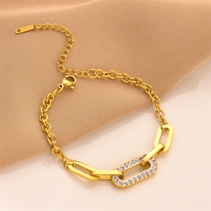 Golden stainless steel chain bracelet featuring a rectangular link with white zircon stones