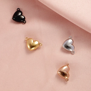 Set of four heart-shaped magnetic jewelry clasps in gold, silver, black, and rose gold