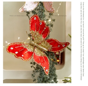 Close-up of velvet butterfly ornament with gold glitter and sequins on a Christmas tree