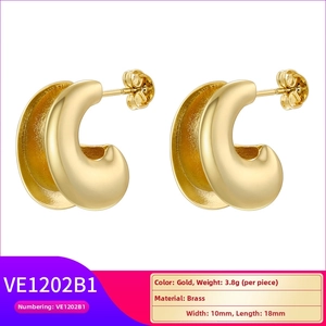 Detail view of gold brass chunky hoop earrings showing 10mm width and 18mm length