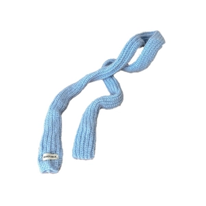 Light blue knitted skinny scarf with VEGETABLE label in minimalist college style