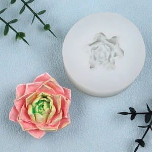 Detailed top view of a 3D peony silicone mold with a finished gradient floral candle