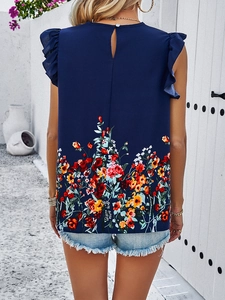 Detail of navy sleeveless floral top featuring ruffled shoulders and back button closure