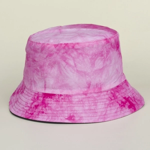 Detail view of the pink tie-dye bucket hat with breathable cotton fabric texture