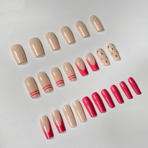 Pink French ballet press-on nails set with rhinestones and square shapes on white background